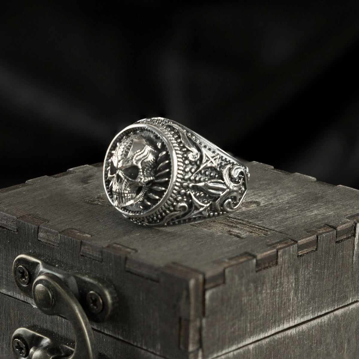 Blade Boss ring angled view showing the skull and textured radial border