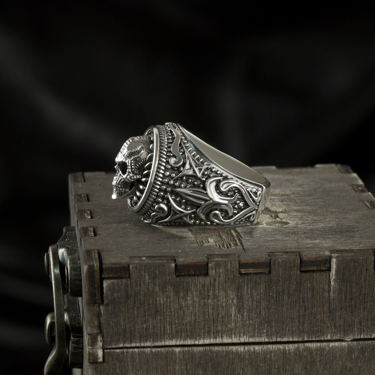 Side view of the Blade Boss ring with decorated shoulder