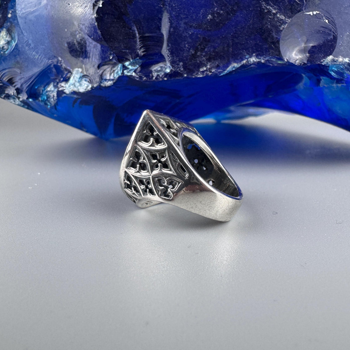 Shield skull ring side profile showing openwork detail