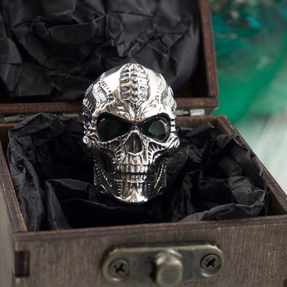 Blade skull silver ring in an open wooden gift box