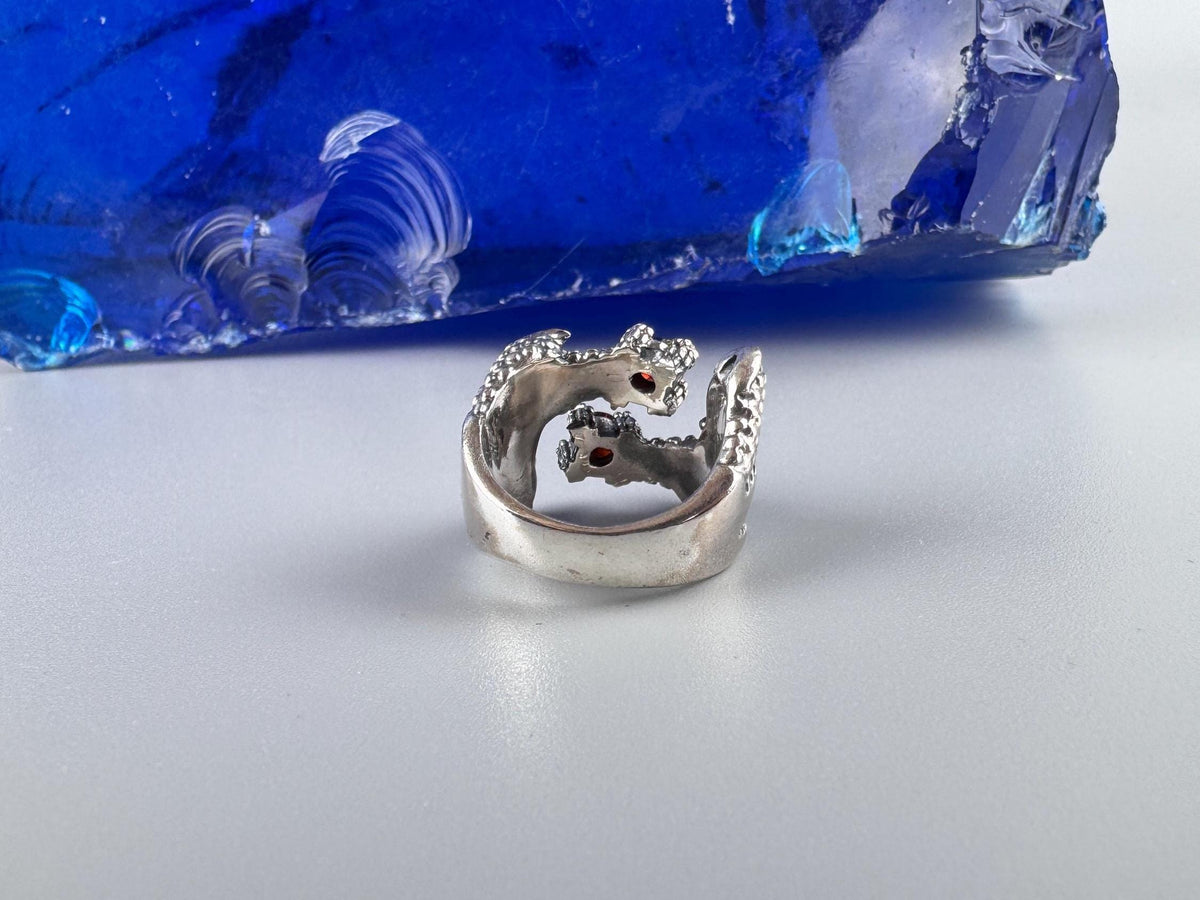 Crimson Claw ring from the back, polished open adjustable band