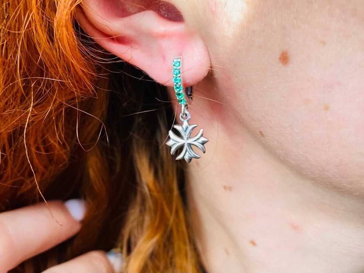Green CZ Maltese Cross earring worn, side view of the ear