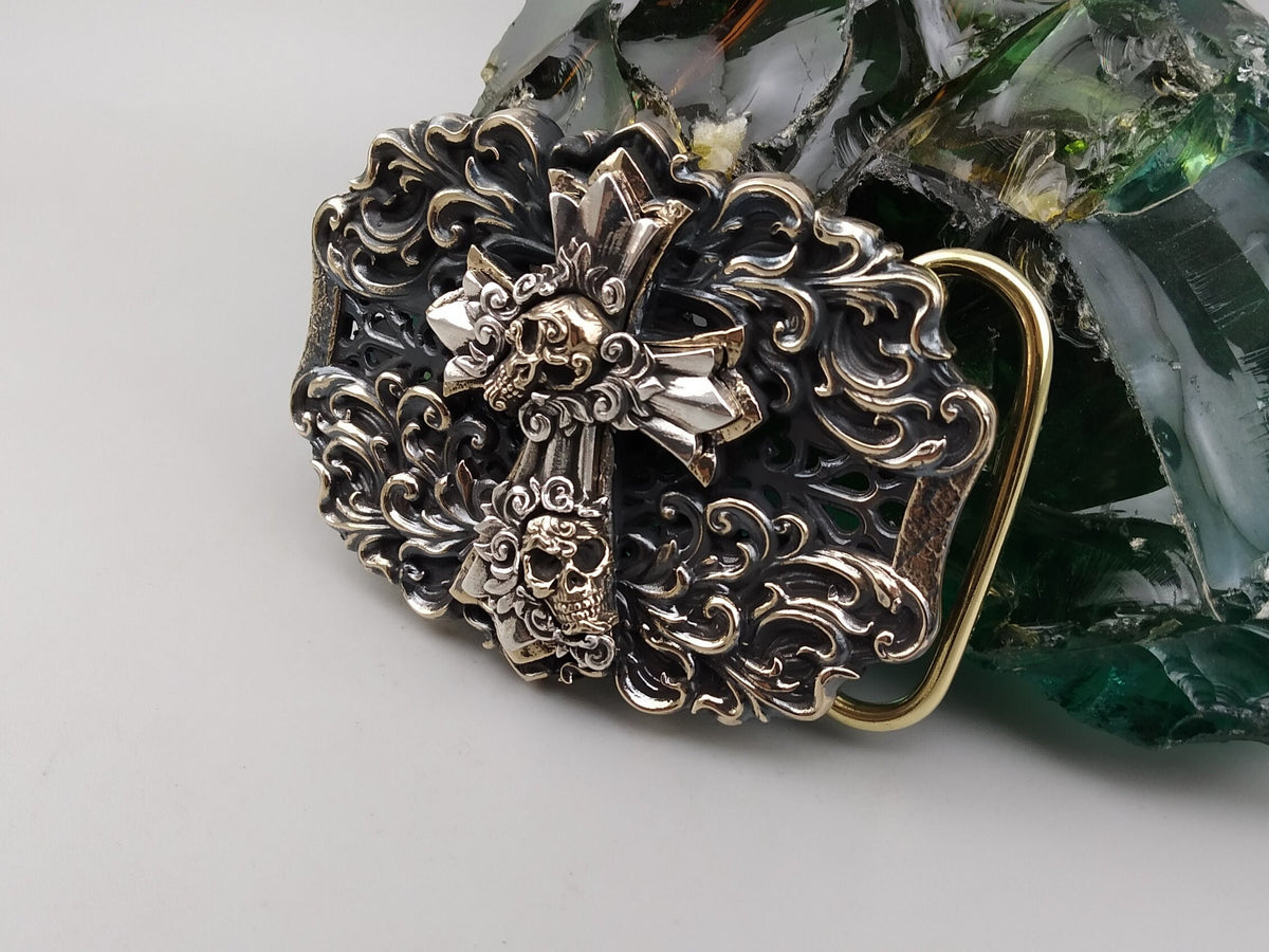 Eternal Conqueror buckle on a light background, full front