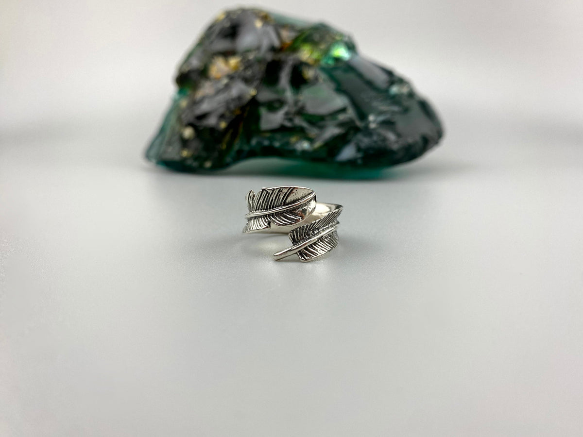 Feather ring in 925 silver, angled view of the wrapped feathers
