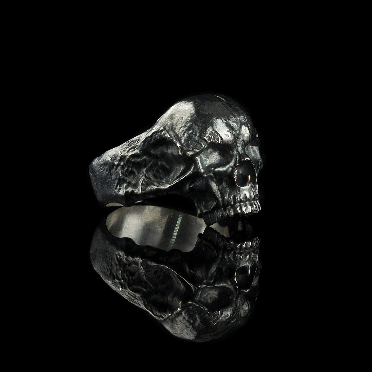 Hellbound heavy silver skull ring, right side view with oxidized cracked shank