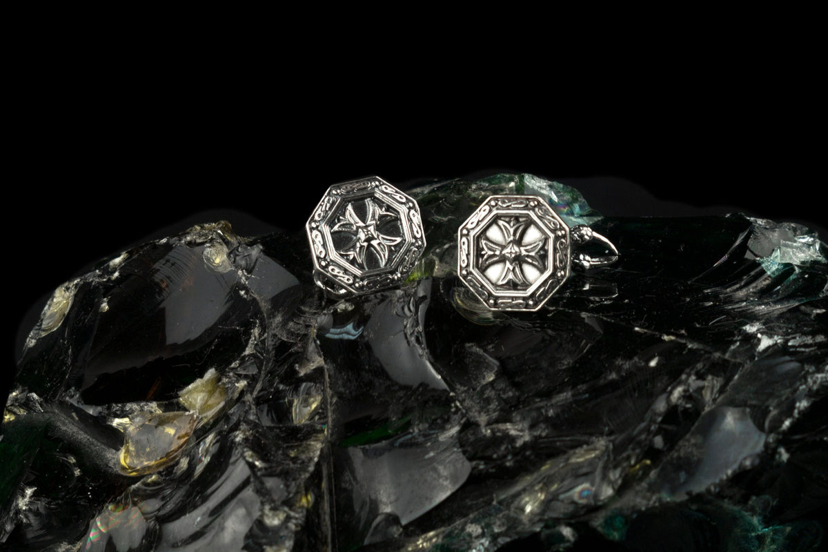 Handcrafted 925 sterling silver "Amalfi" octagonal cufflinks featuring a sculpted Maltese Cross on a dark glass background