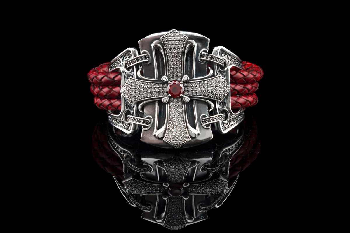 Gothic sterling silver cross bracelet with cubic zirconia, red center stone and red braided leather on black