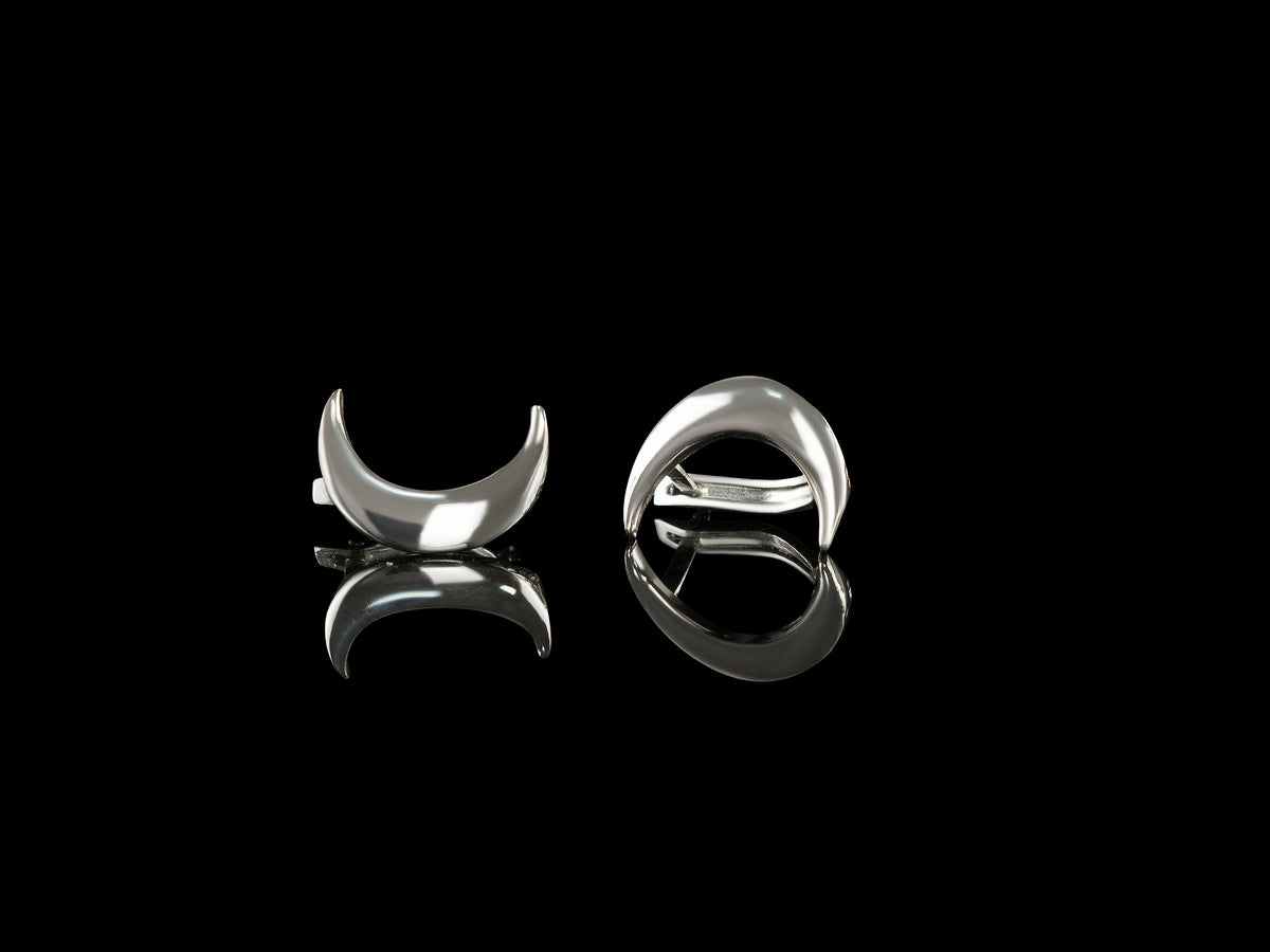 White Polish Moon 925 sterling silver crescent moon earrings with high-polish finish on a black background.