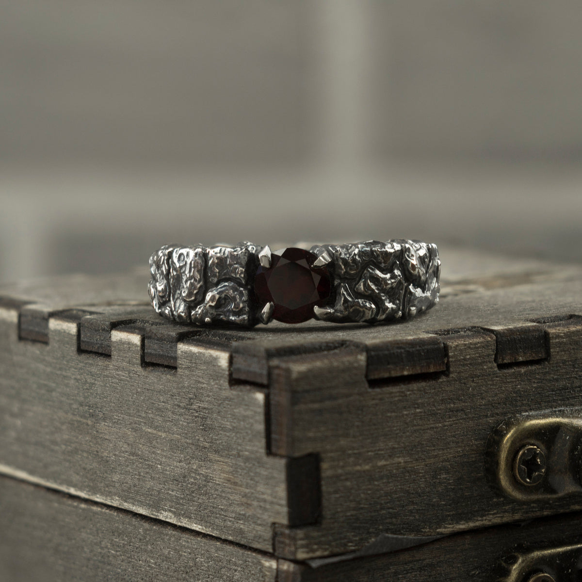 MONS IGNEUS 925 sterling silver ring with natural deep red garnet and rugged volcanic rock-inspired texture
