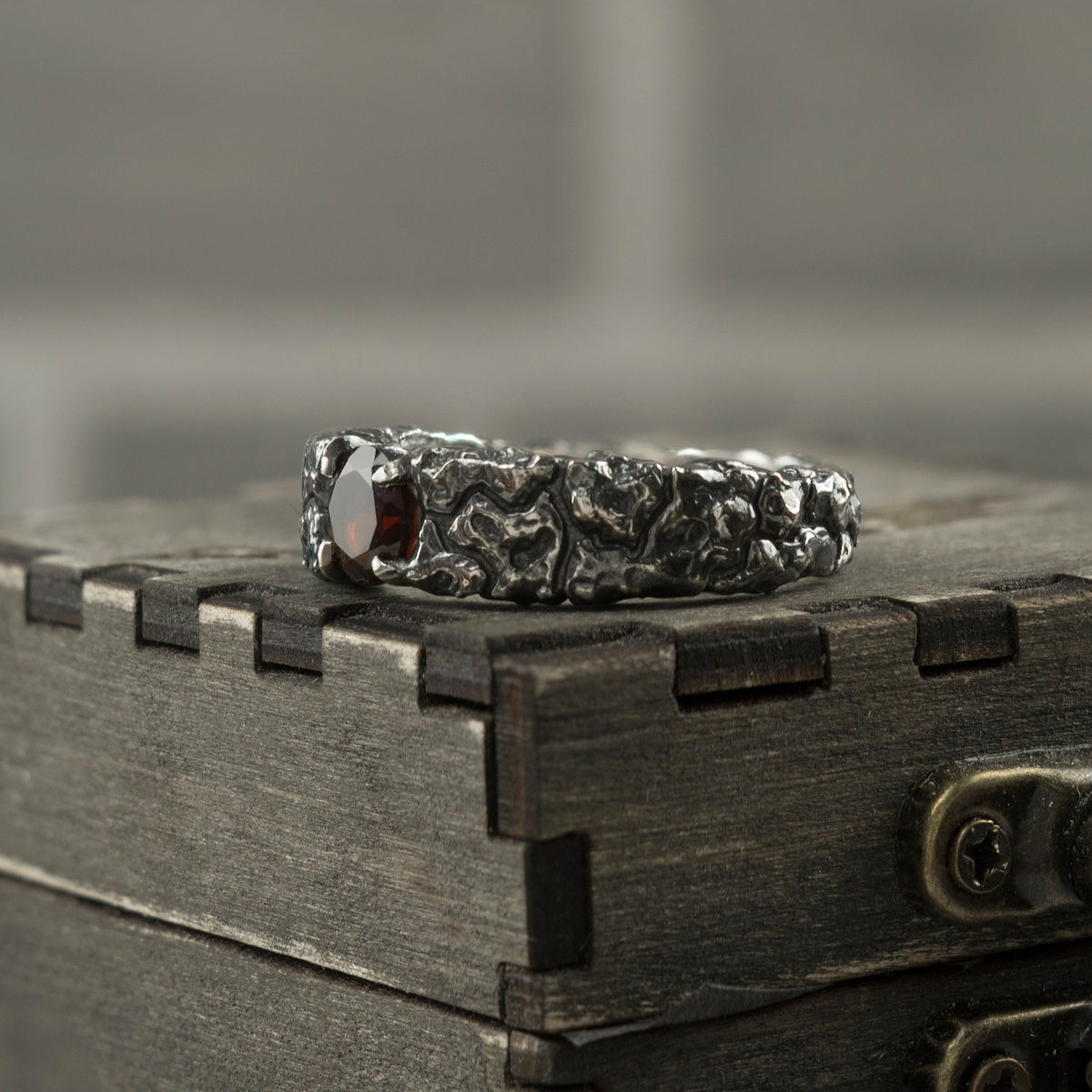 MONS IGNEUS 925 sterling silver ring with natural deep red garnet and rugged volcanic rock-inspired texture