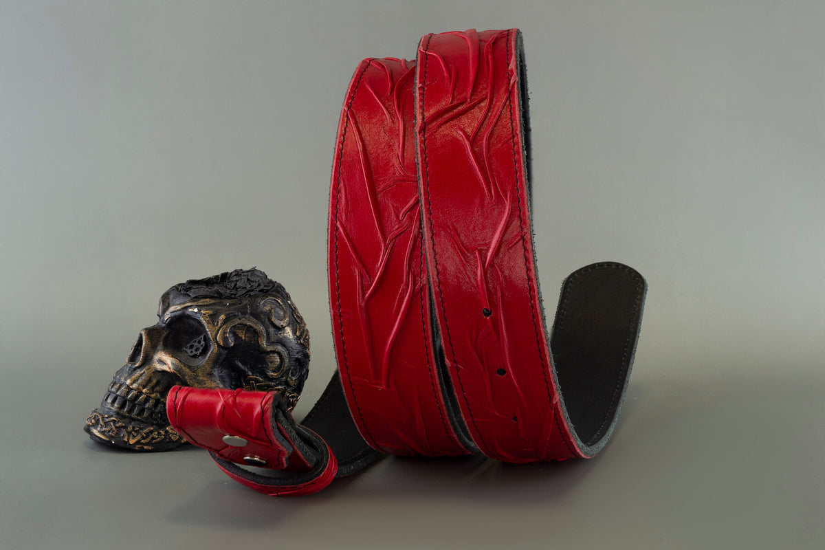 Handmade red genuine leather belt strap with embossed textured design, two-layer construction and 38 mm width