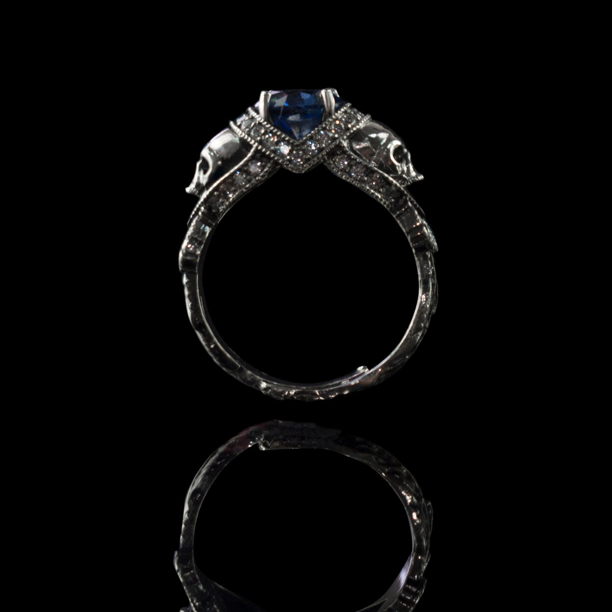 Atropos 925 sterling silver skull ring with blue cubic zirconia and gothic biker design