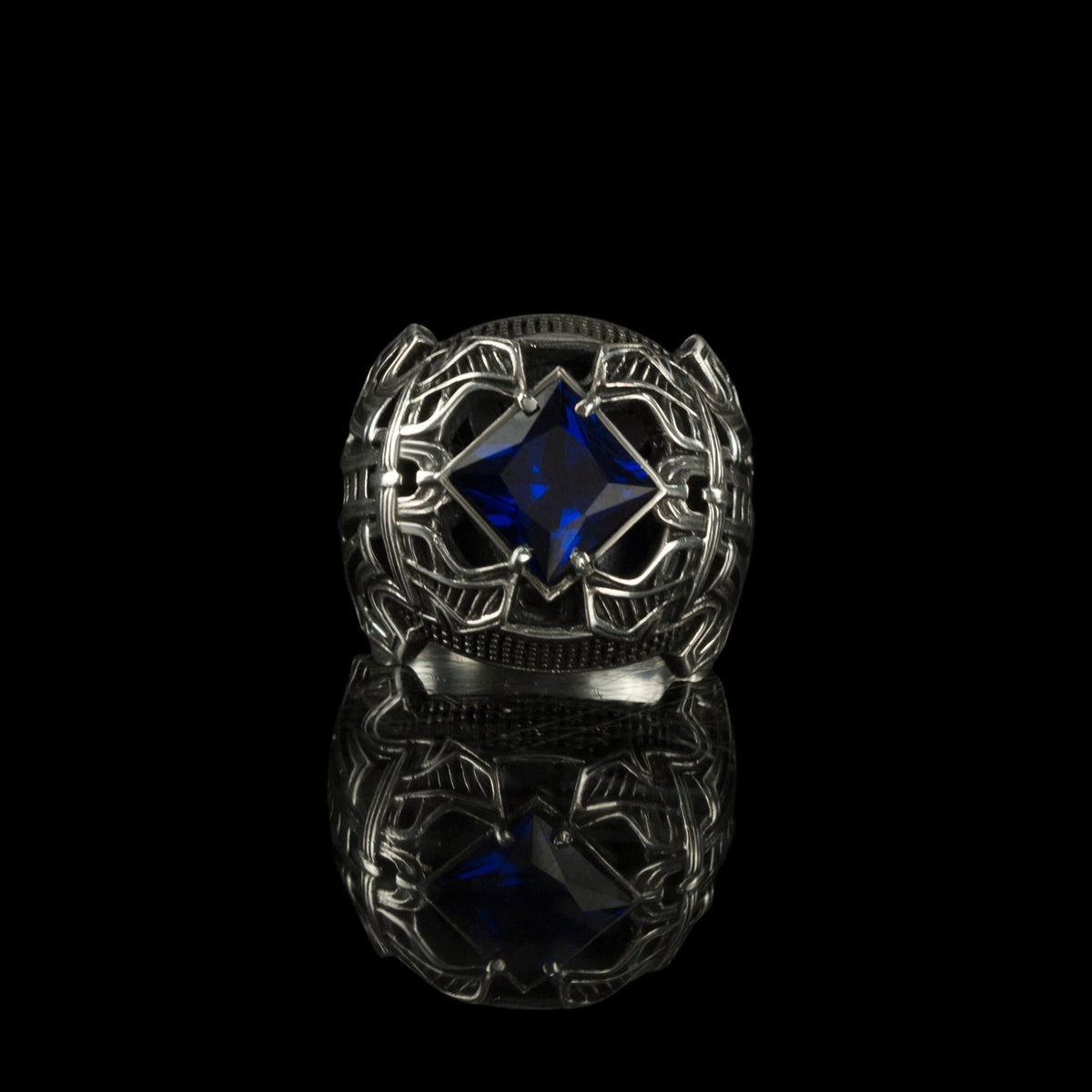 Octavius 925 sterling silver signet ring with deep blue cubic zirconia and gothic relief