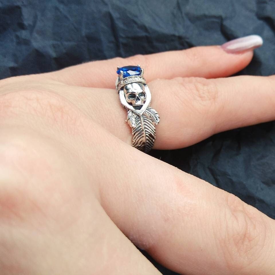 Atropos 925 sterling silver skull ring with blue cubic zirconia and gothic biker design