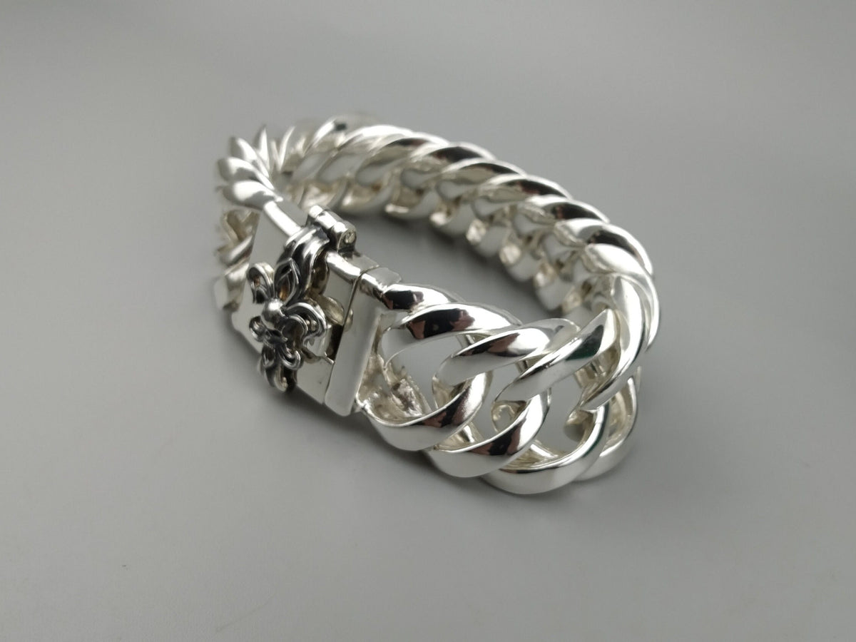 Heavy 925 sterling silver Cuban link bracelet with gothic skull emblem clasp