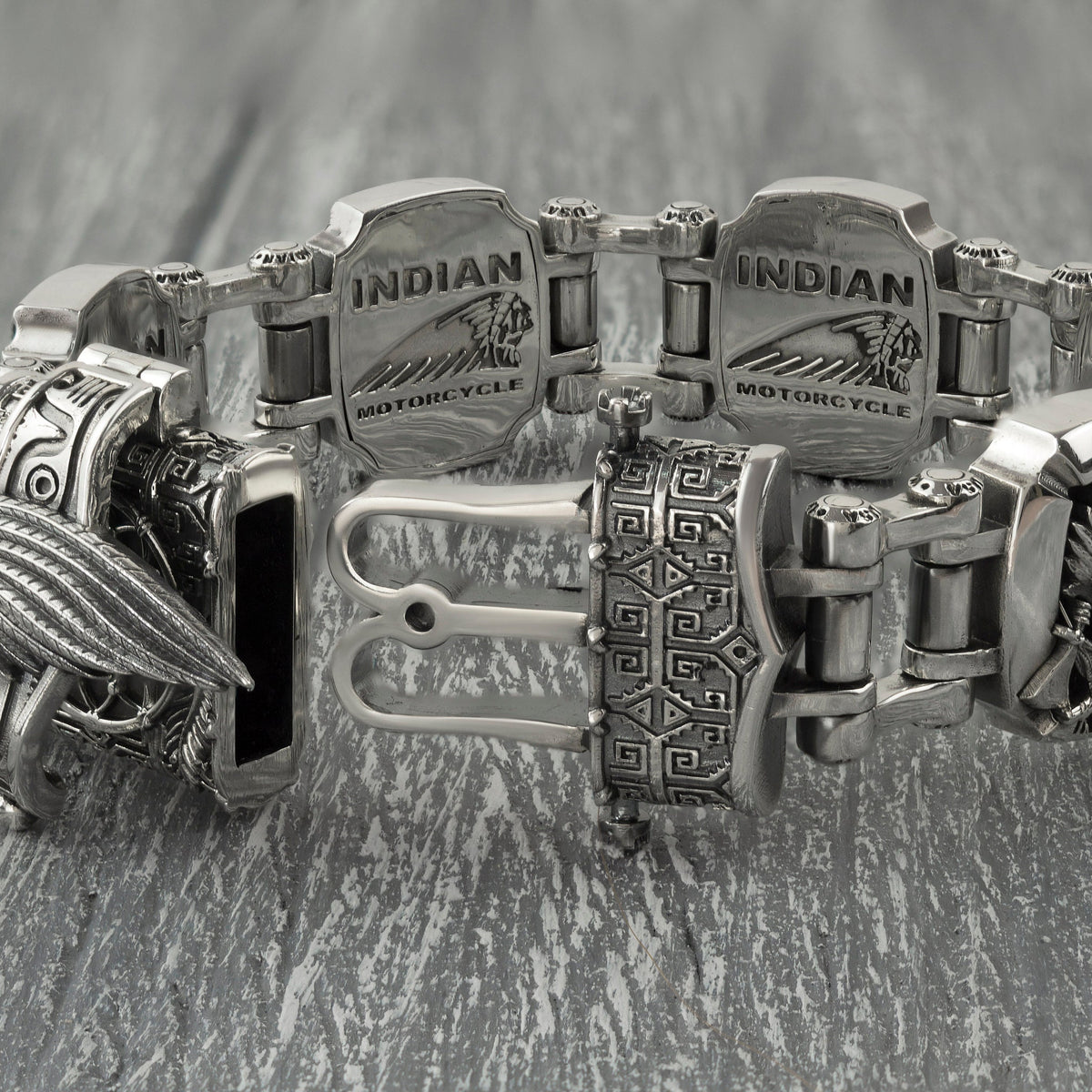 Indian heavy bracelet laid straight, engraved plate details
