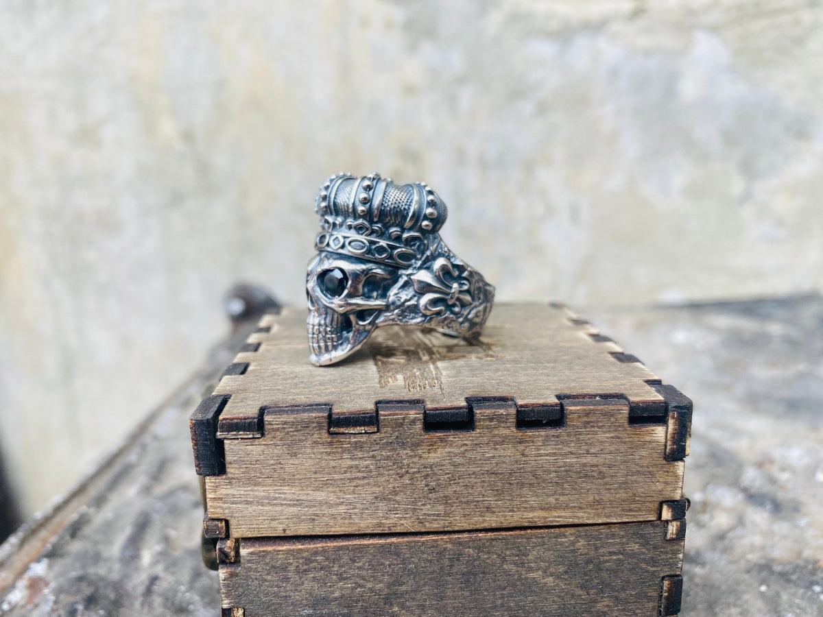 Heavy crowned skull biker ring, three-quarter view