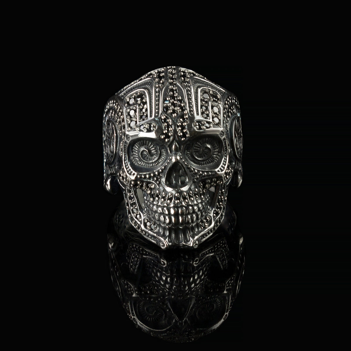 Black stone sugar skull ring front view on black background