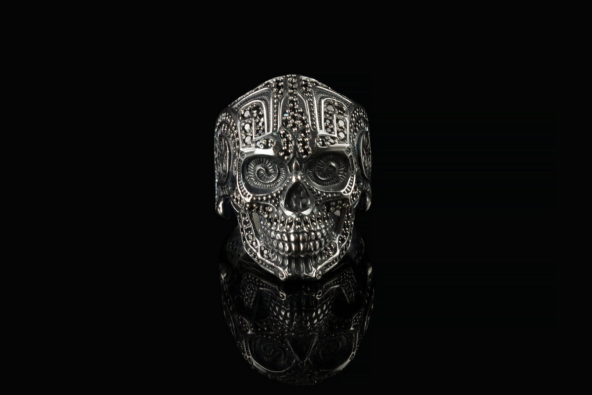Black stone sugar skull ring front view on black background