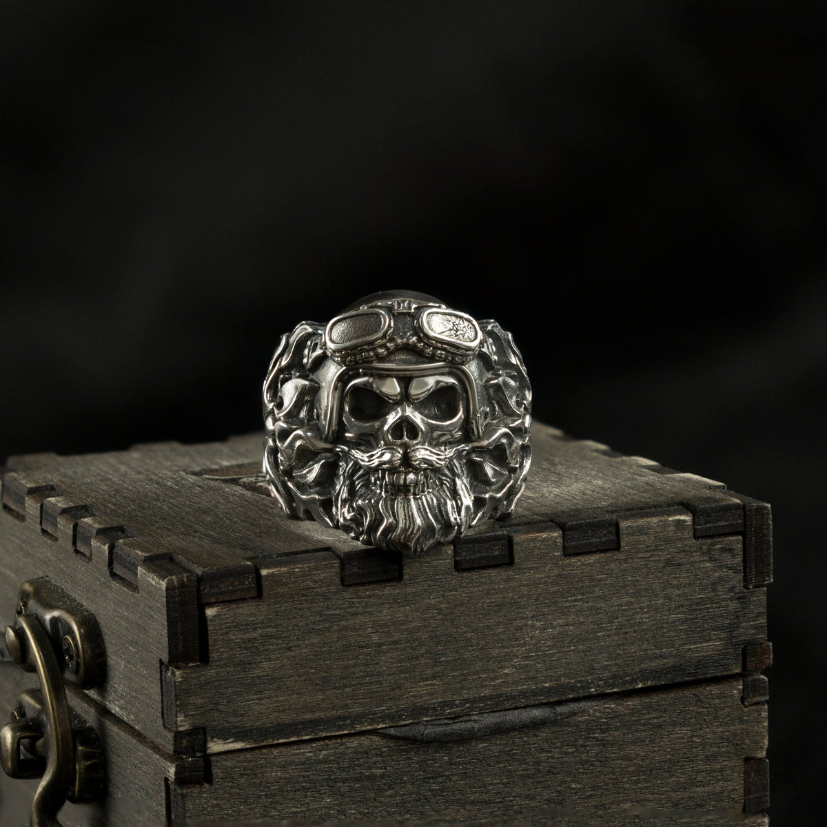 Rider skull ring front view, bearded skull and goggles in oxidized silver