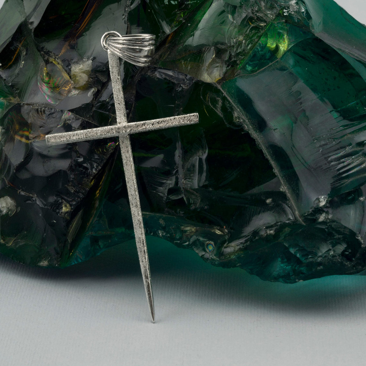 Men's silver spike cross pendant, full length with pointed end