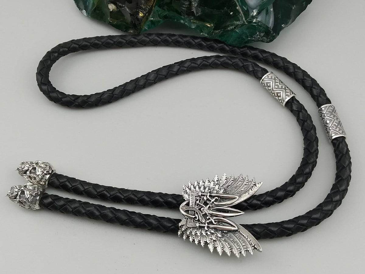 Ukrainian Tryzub bolo tie with winged sterling silver slide, silver beads and skull tips on black braided leather