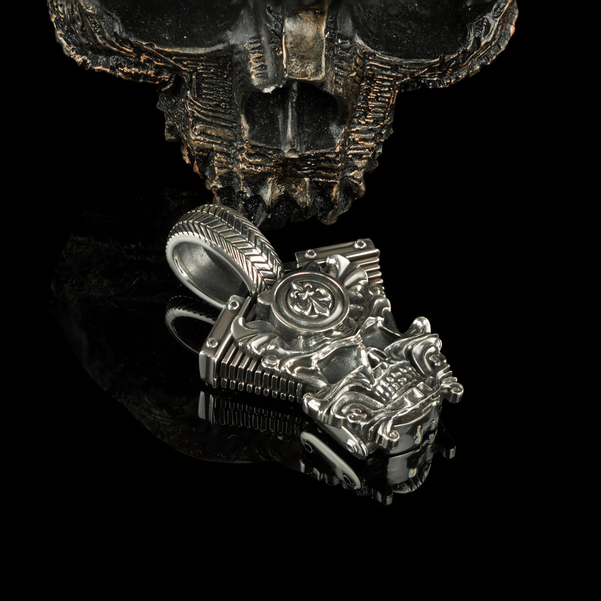 Vigor motorcycle skull pendant on black, side angle
