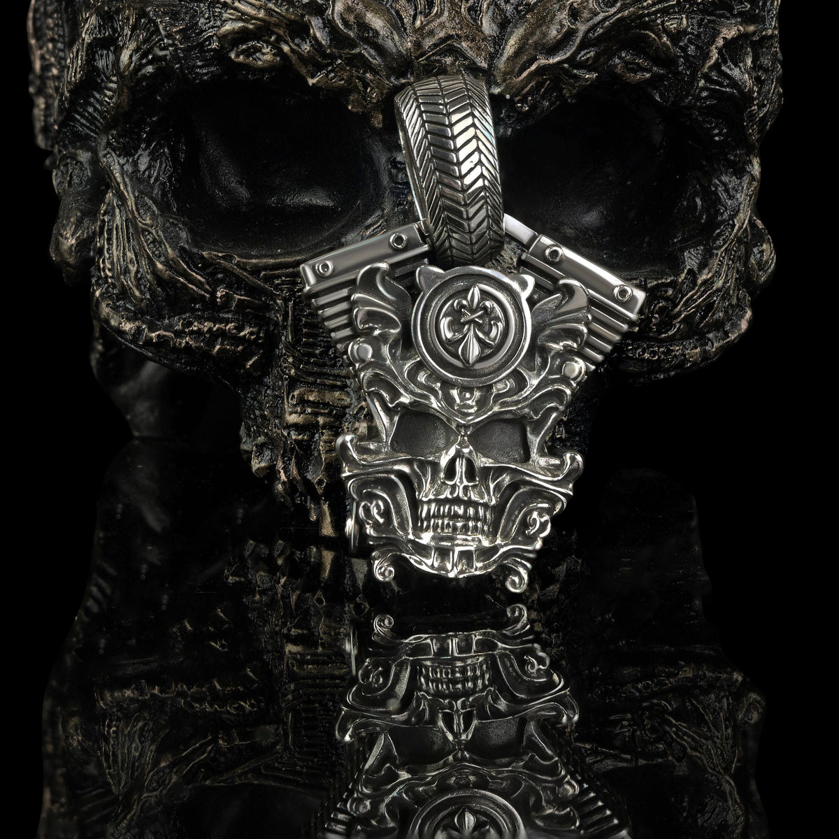 Vigor skull pendant on black background, front view