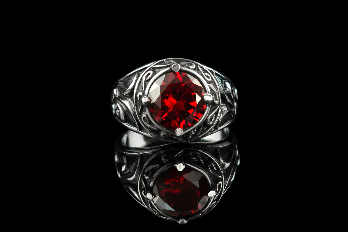 Viking ring front view, faceted red cubic zirconia in a raised bezel