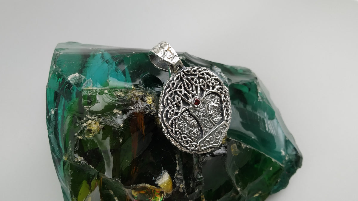 Yggdrasil silver pendant front with red cubic zirconia at the center