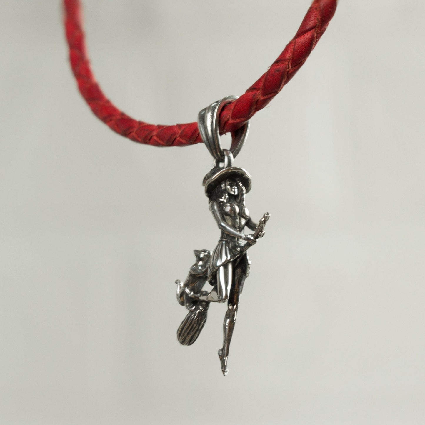 Flying witch with cat pendant with red leather necklace  Silver witch on a Broomstick  Witches jewelry