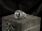 Blade Boss ring angled view showing the skull and textured radial border