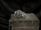 Side view of the Blade Boss ring with decorated shoulder