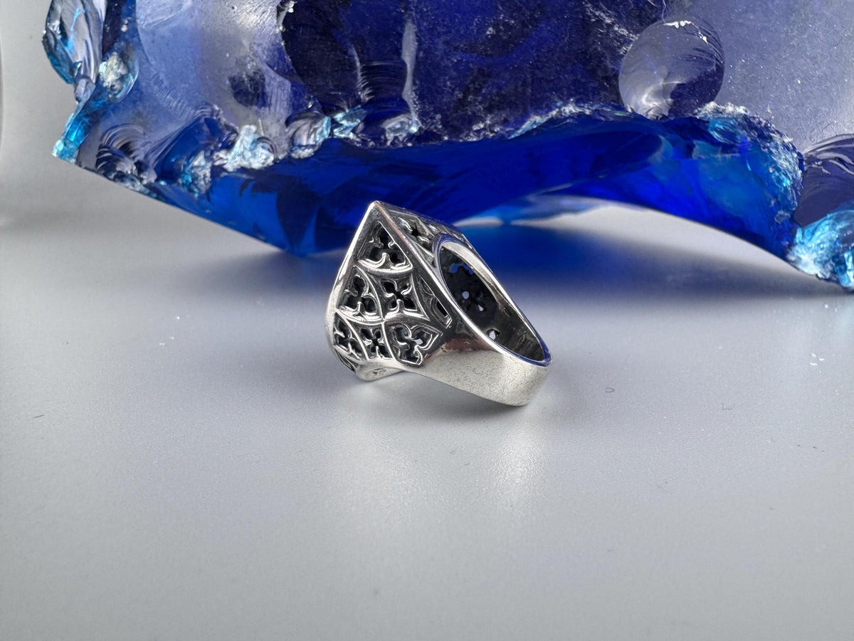 Shield skull ring side profile showing openwork detail