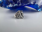 Shield skull ring from the side, ornate shoulder and band