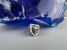 Shield-shaped skull signet ring, angled top view
