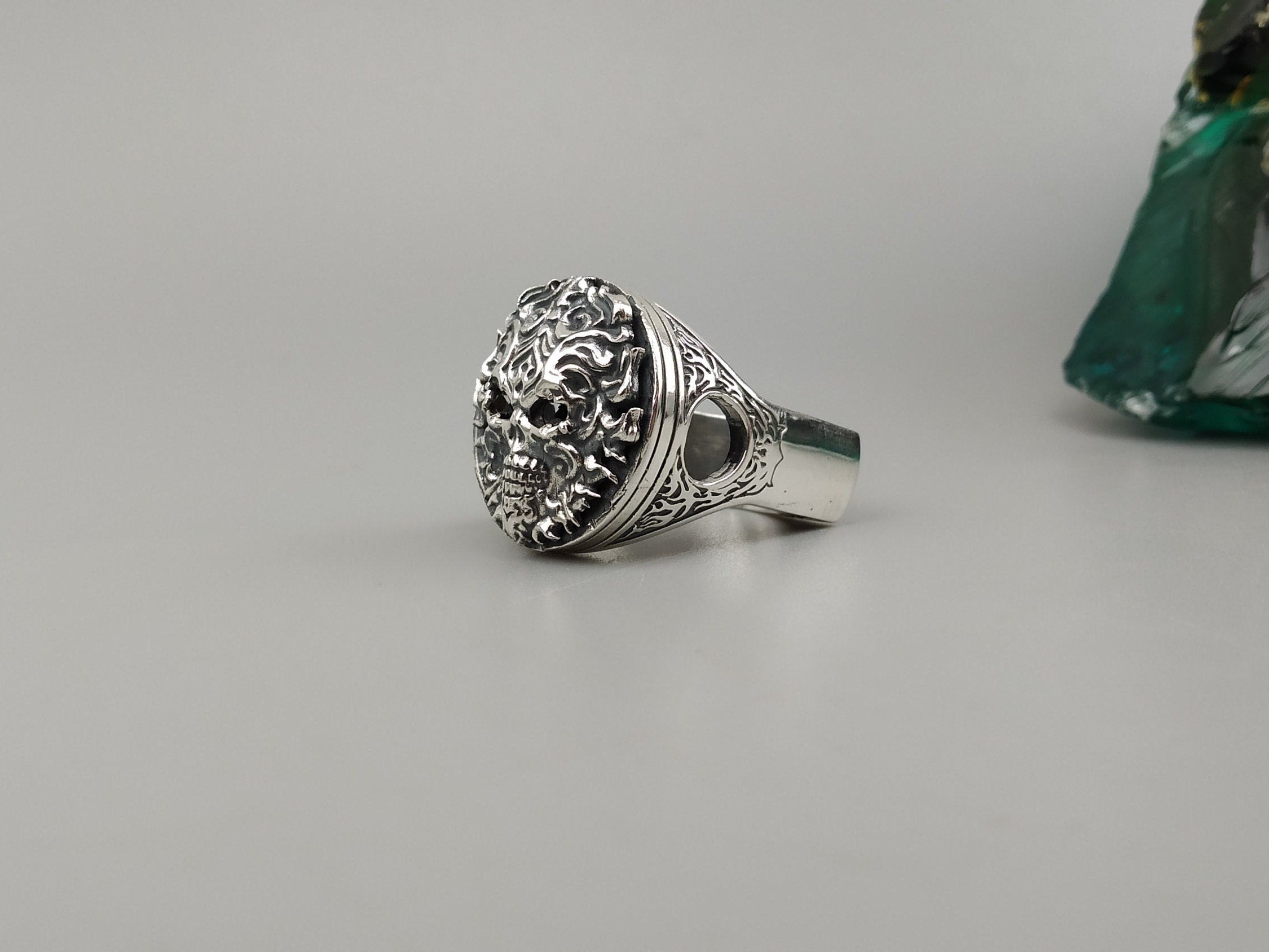 Blazing biker ring standing upright, oxidized flame filigree detail