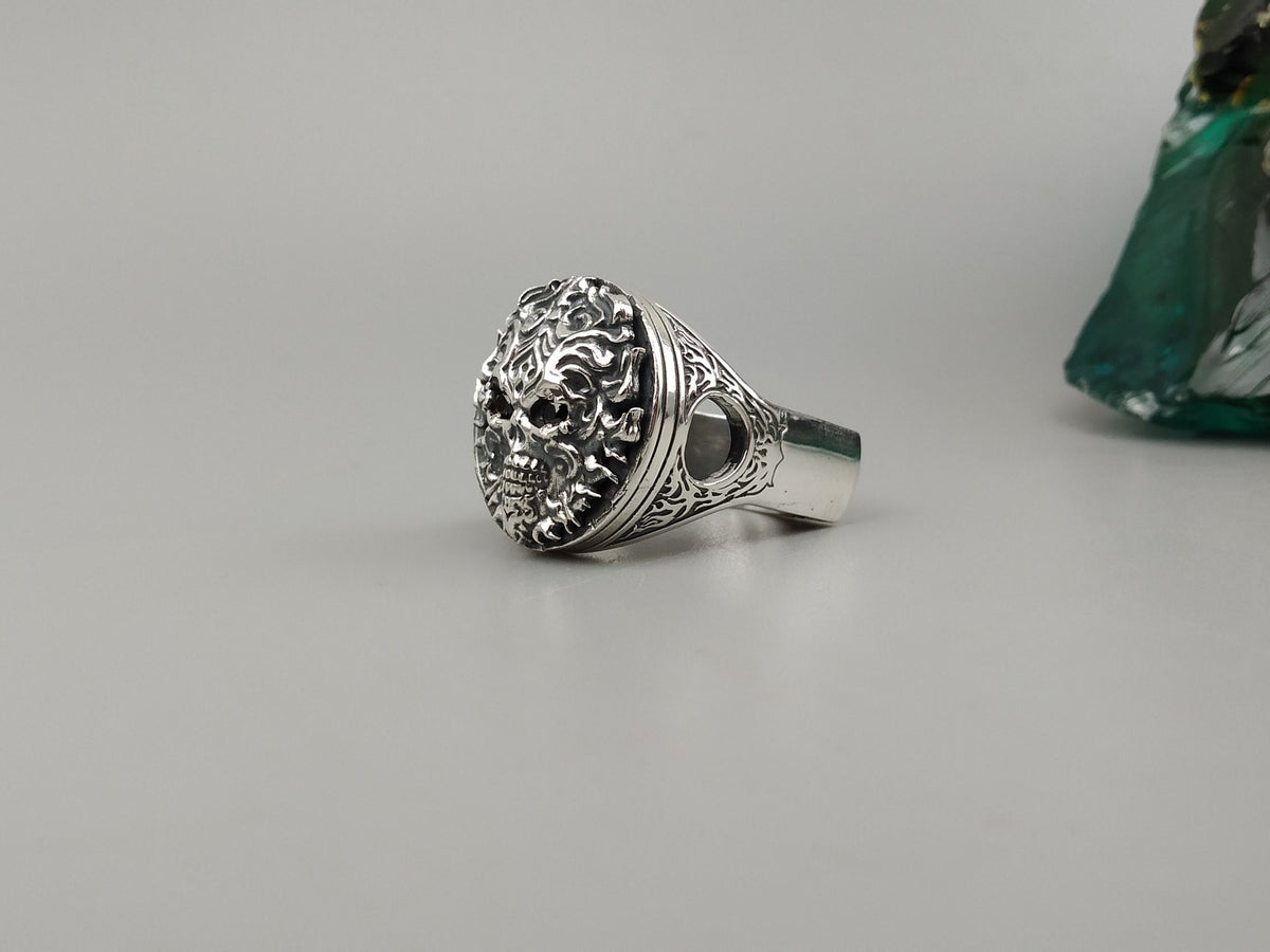 Blazing biker ring standing upright, oxidized flame filigree detail