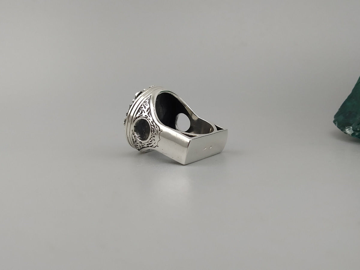Side profile of the heavy piston skull ring showing the mechanical cutouts