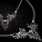Dark Angel women's silver necklace with thick woven chain and winged skull centerpiece