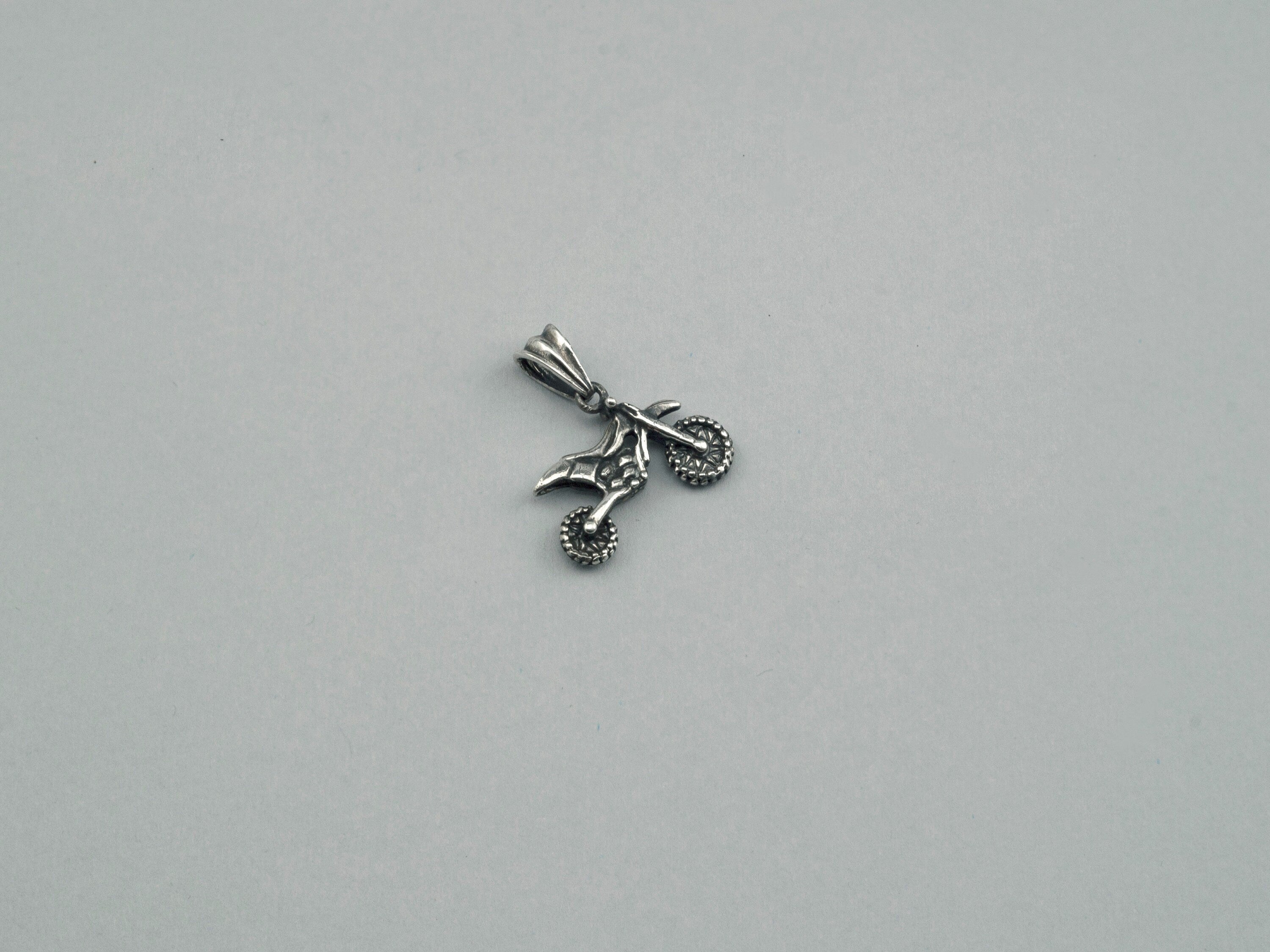Enduro motorcycle charm in 925 silver, second side view with bail