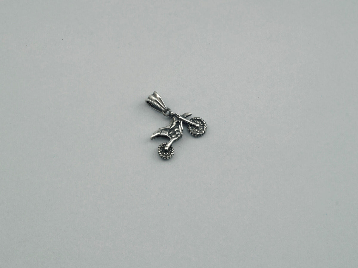 Enduro motorcycle charm in 925 silver, second side view with bail