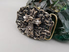 Eternal Conqueror buckle on a light background, full front