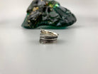 Boho sterling silver feather ring, top view of the bypass design