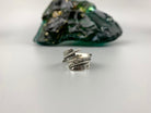Feather wrap ring front view showing the open adjustable band