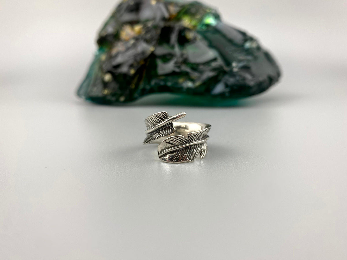 Feather wrap ring front view showing the open adjustable band