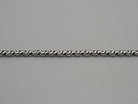 Close-up of Forge 5 mm chain links with oxidized interlocking pattern