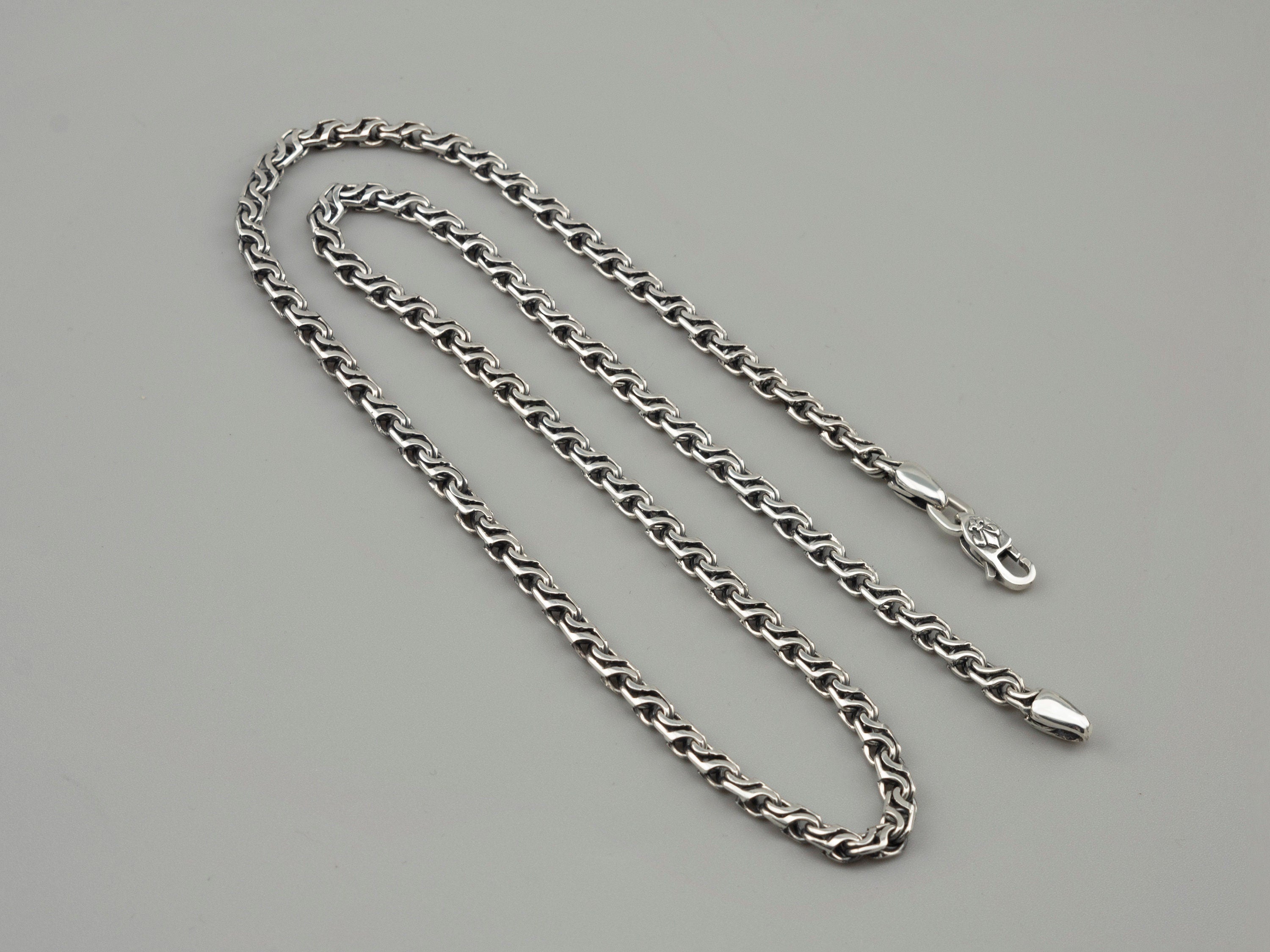 Forge 5 mm sterling silver chain laid out full length with lobster clasp and end cap