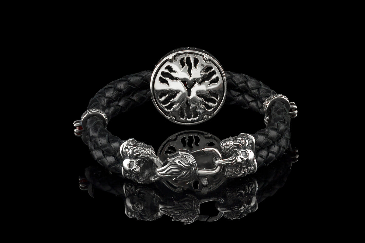 Back of the silver skull medallion and sculpted clasp on the black braided leather bracelet