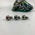 Furious Bonnie rings shown in a row with different center stones